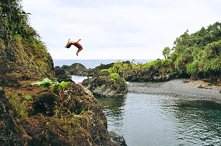 woman doing backflip into water thumbnail
