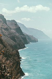 aerial photography of cliff near body of water thumbnail