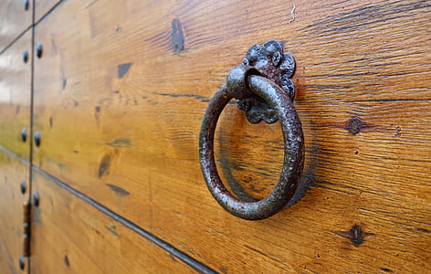 close up photo of gray steel cabinet handle thumbnail