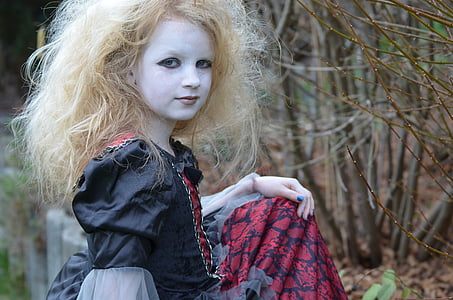 girl wearing black and red long-sleeved dress thumbnail