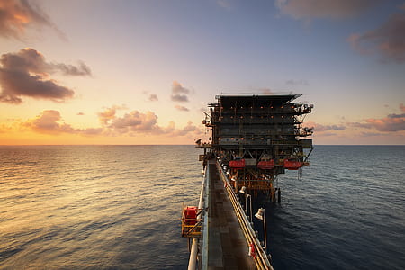 Heavy Equipment on Body of Water Under Blue and White Cloudy Skies thumbnail