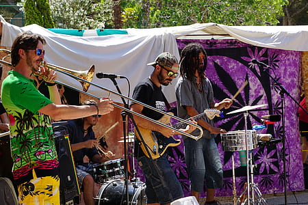 three person playing instruments thumbnail
