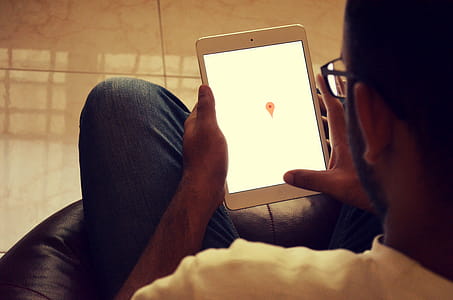 Young creative man with tablet computer thumbnail