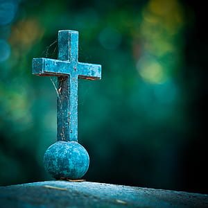 selective focus photo of a cross on grey pavement thumbnail