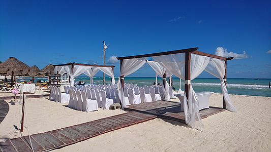 white canopy with brown wooden frames during daytime thumbnail