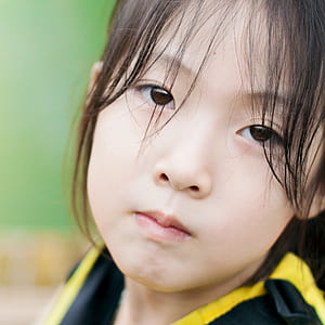 girl wearing yellow and black top thumbnail