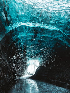 cave surrounded body of water thumbnail