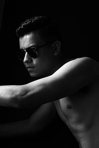gray-scale photo of ma with sunglasses thumbnail