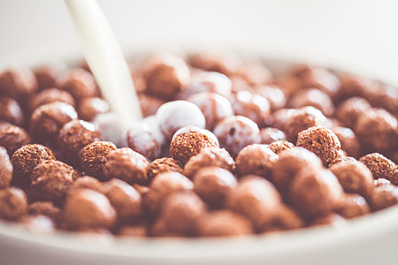 Milk Pouring on Cereal Chocolate Balls thumbnail