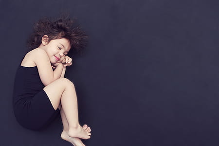 girl wearing black sleeveless dress thumbnail