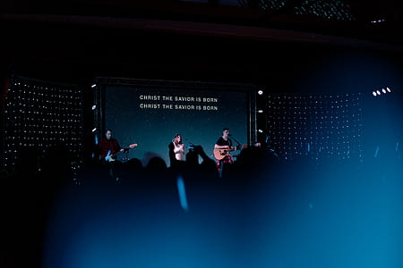 person singing worship song inside room thumbnail