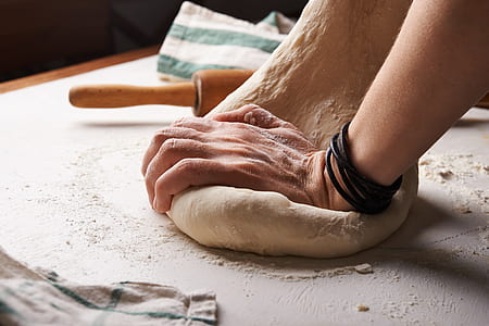 person kneading dough thumbnail