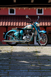 parked blue and black cruiser motorcycle thumbnail
