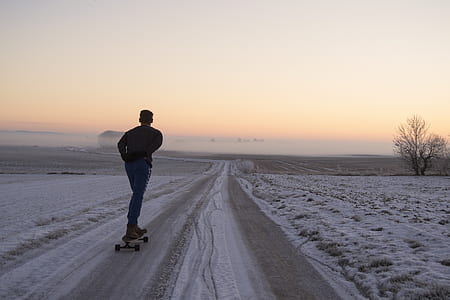 man riding long boar thumbnail