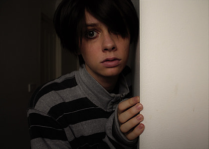 woman in grey and black striped long-sleeved shirt thumbnail