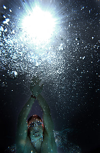 person diving underwater thumbnail