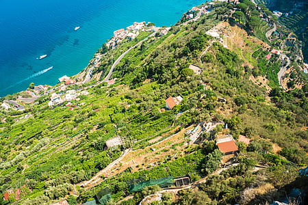 aerial view of island beside body of water thumbnail