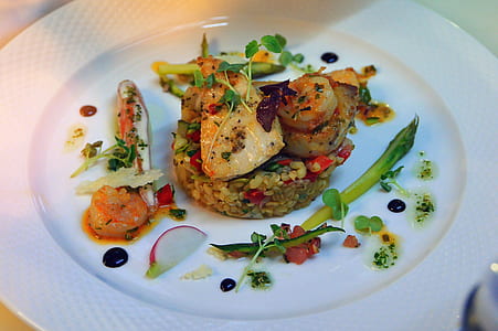 cooked food served on plate thumbnail