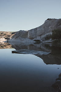 docking pier drowned on body of water thumbnail