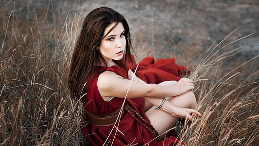 woman sitting on grass thumbnail