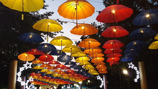 assorted-color lighted umbrellas thumbnail
