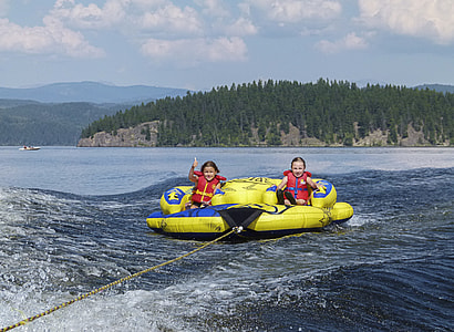 two person on yellow floating raft thumbnail