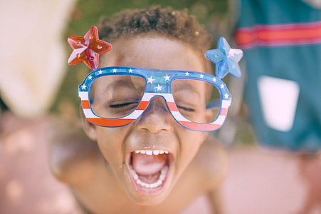 children wearing eyeglasses in shallow focus photography thumbnail
