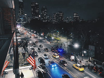 lighted streets and vehicles on road thumbnail