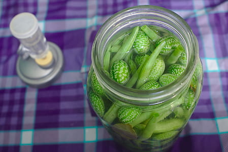green vegetables in clear glass jar thumbnail