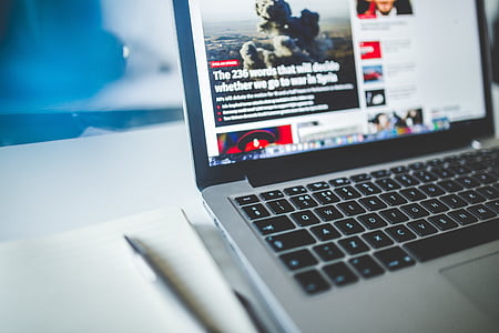 turned-on MacBook Pro thumbnail