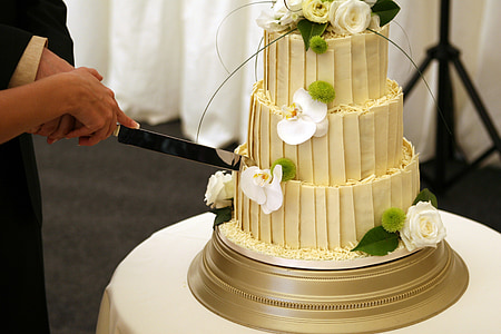 3-layer fondant cake on white table thumbnail
