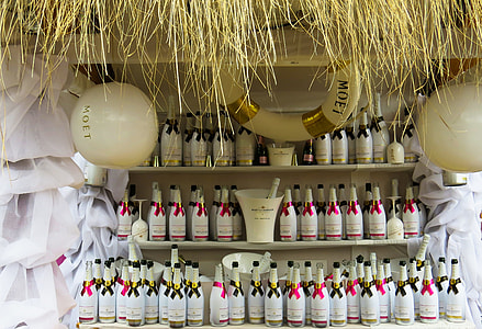 bottle lot on brown wooden shelf thumbnail