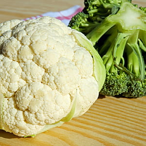 photo of broccoli and cauliflower vegetables on wooden surface thumbnail