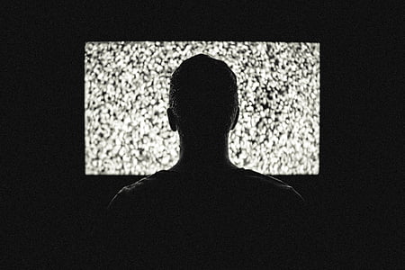 silhouette of man watching TV thumbnail