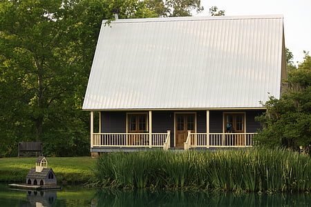 white and brown wooden house at daytime thumbnail