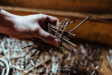 Tools, nails and bolts in a workshop thumbnail