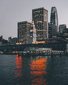 San Francisco bay overlooking high-rise and multi-storey buildings under grey daytime sky thumbnail