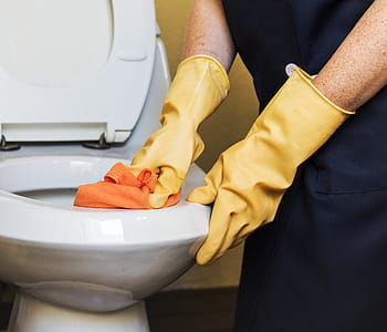 Person Wearing Pair of Yellow Rubber Gloves thumbnail