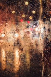 window droplets bokeh lights photo thumbnail