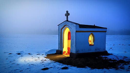 white church under white sky thumbnail