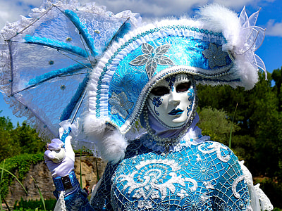 person wearing masquerade mask and umbrella thumbnail
