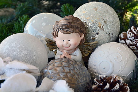 white angel figurine thumbnail