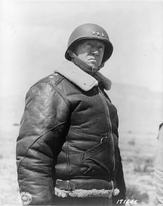 grayscale photography of man wearing helmet and leather jacket thumbnail