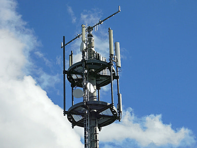gray metal tower under white and blue skty thumbnail