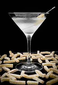 cocktail glass filled with white liquid thumbnail