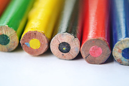 assorted color pencils on white surface thumbnail