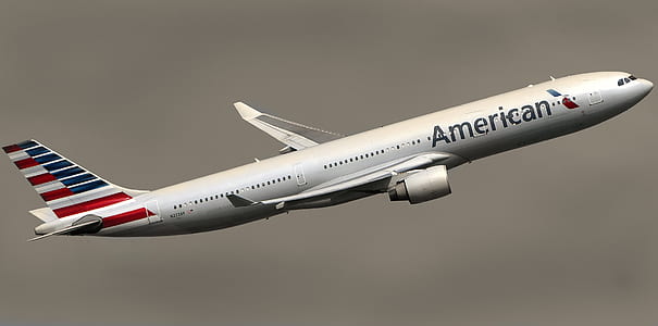 white American airplane flew in mid air thumbnail