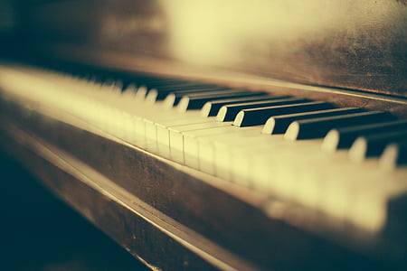shallow focus photo of black and white piano thumbnail
