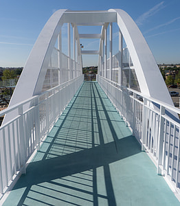 white and teal bridge during daytime thumbnail