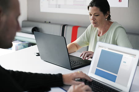 woman sitting on chair front of laptop thumbnail